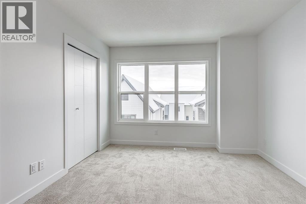 Primary bedroom - 202, 437 Alpine Avenue Sw, Calgary, AB - Indoor Photo Showing Other Room