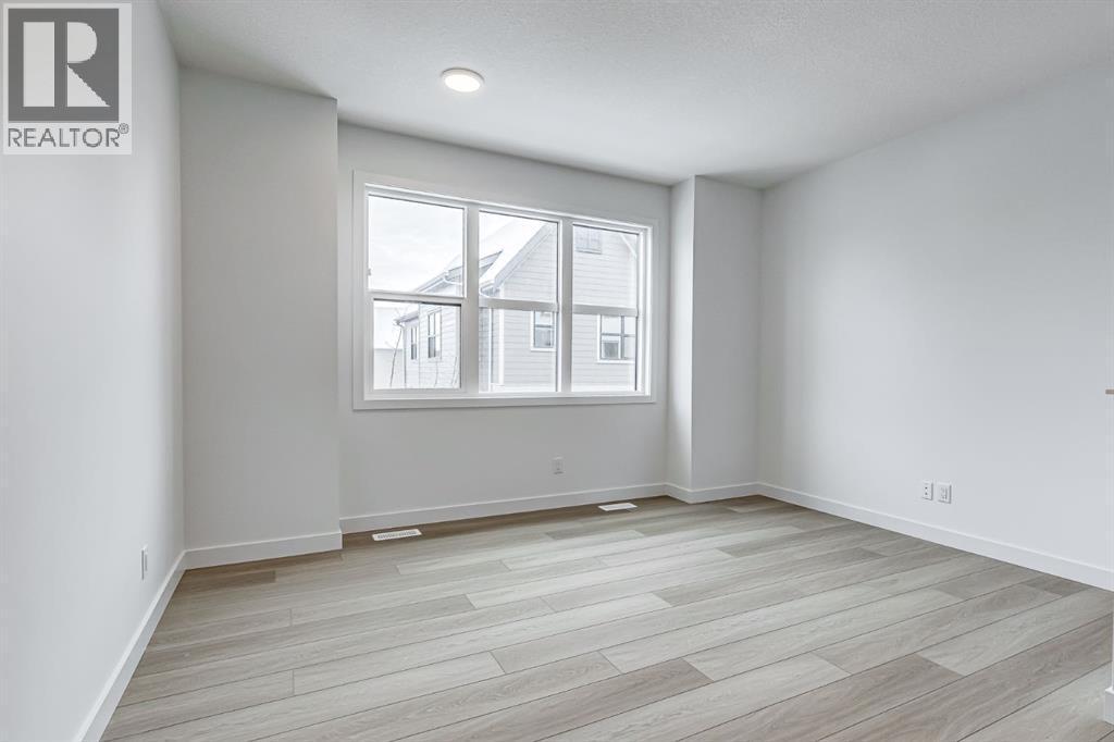 2nd bedroom - 202, 437 Alpine Avenue Sw, Calgary, AB - Indoor Photo Showing Other Room