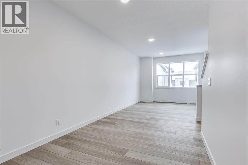 202, 437 Alpine Avenue Sw, Calgary, AB - Indoor Photo Showing Other Room