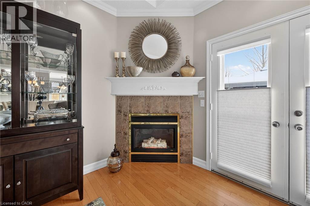 57 Bluelagoon Drive, Mount Hope, ON - Indoor Photo Showing Living Room With Fireplace