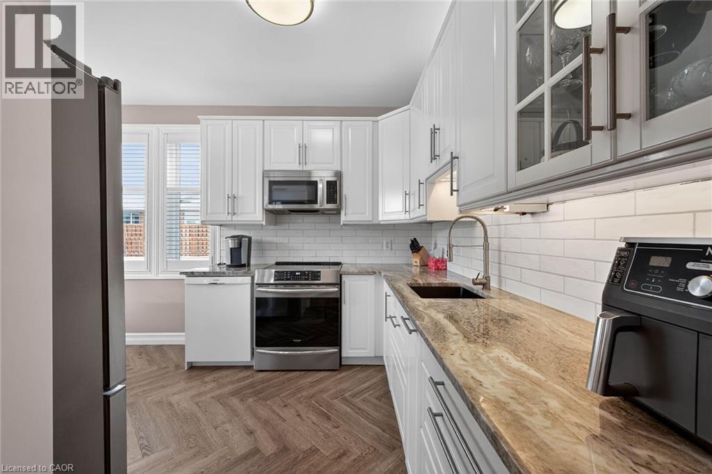 57 Bluelagoon Drive, Mount Hope, ON - Indoor Photo Showing Kitchen With Upgraded Kitchen