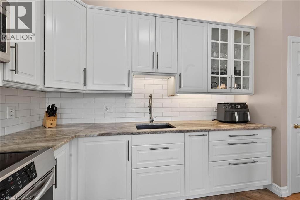 57 Bluelagoon Drive, Mount Hope, ON - Indoor Photo Showing Kitchen With Upgraded Kitchen