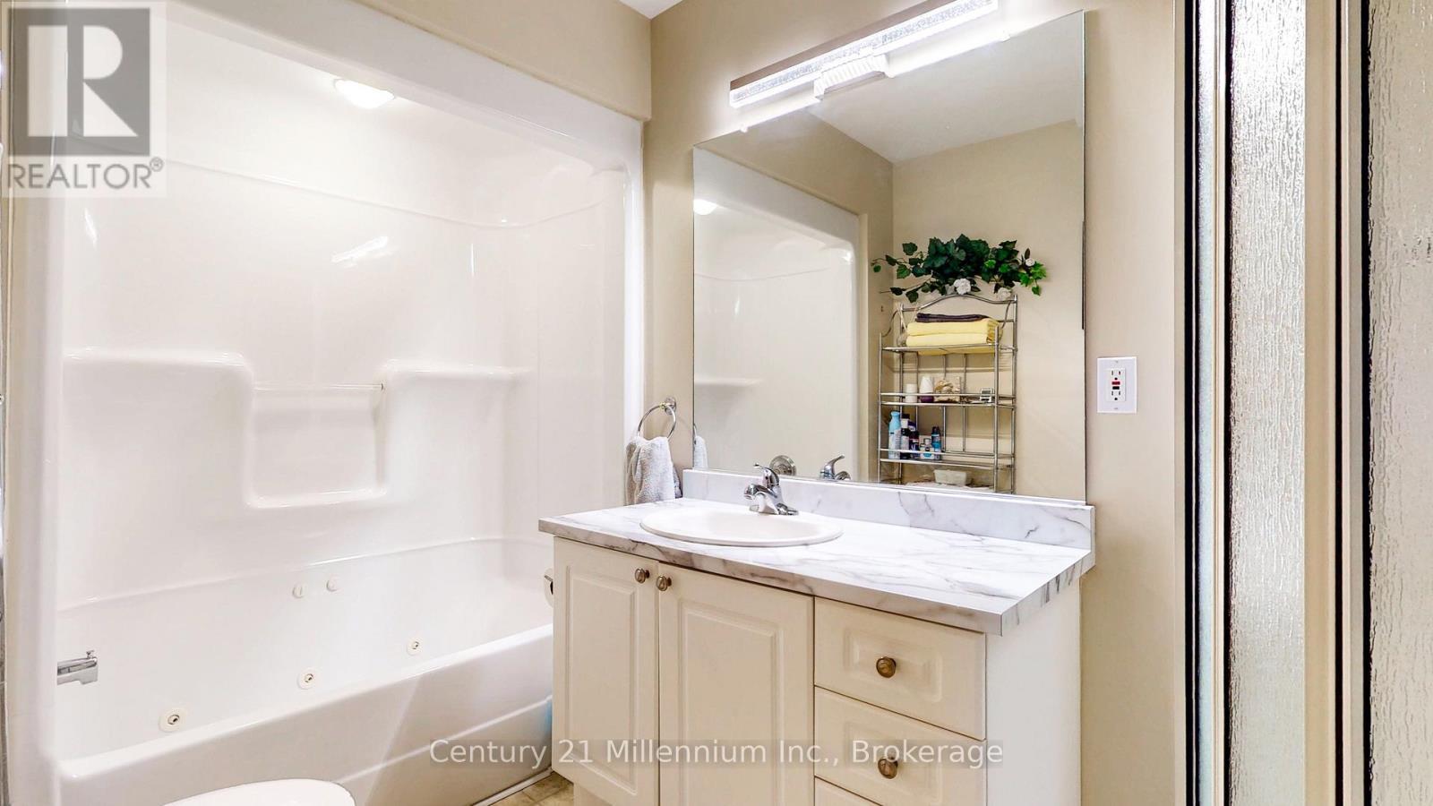 Ensuite Vanity and Tub - 29 Ridge Creek Drive, Meaford, ON - Indoor Photo Showing Bathroom
