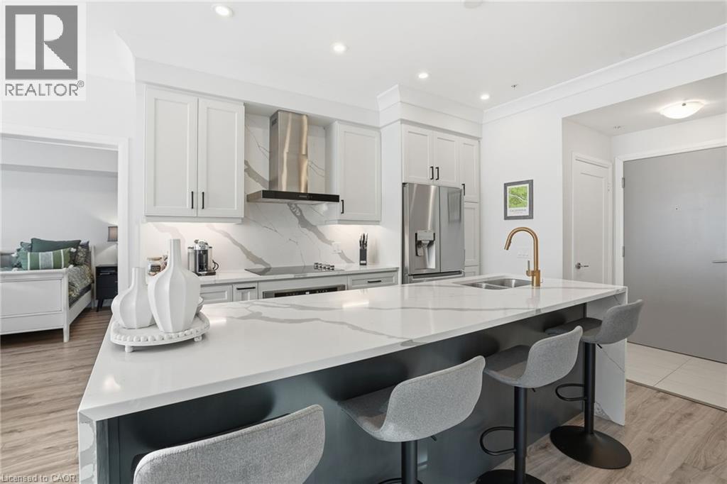 16 Concord Place Unit# 346, Grimsby, ON - Indoor Photo Showing Kitchen With Double Sink With Upgraded Kitchen