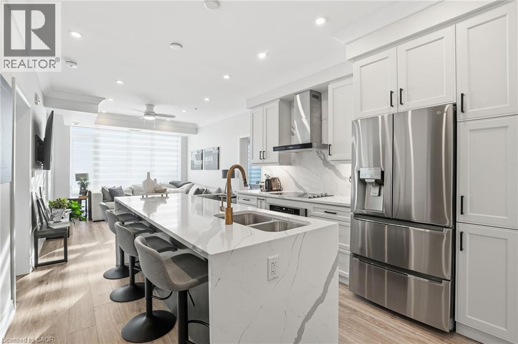 16 Concord Place Unit# 346, Grimsby, ON - Indoor Photo Showing Kitchen With Stainless Steel Kitchen With Double Sink With Upgraded Kitchen