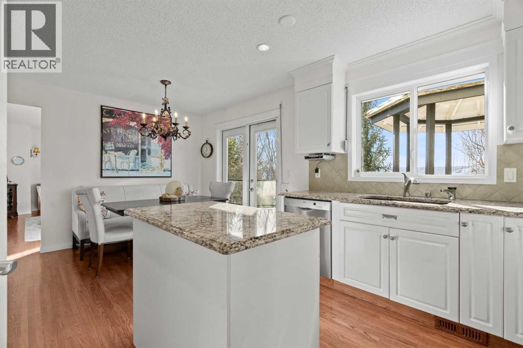 63 Springbank Crescent Sw, Calgary, AB - Indoor Photo Showing Kitchen With Upgraded Kitchen