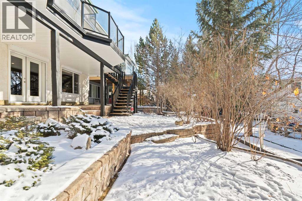 63 Springbank Crescent Sw, Calgary, AB - Outdoor With Deck Patio Veranda