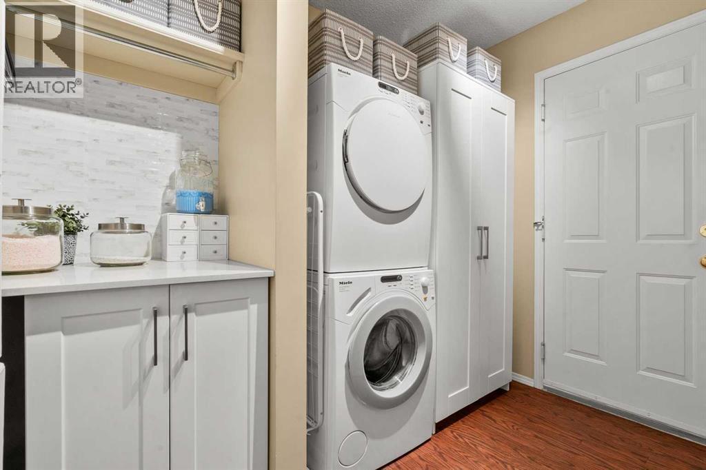 63 Springbank Crescent Sw, Calgary, AB - Indoor Photo Showing Laundry Room