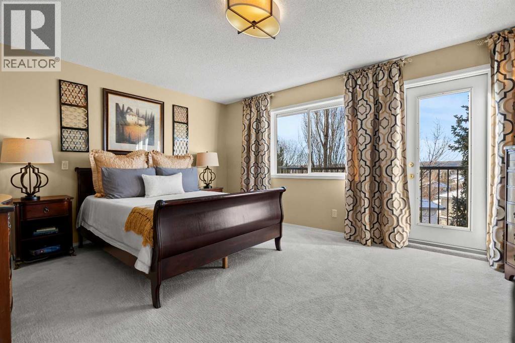 63 Springbank Crescent Sw, Calgary, AB - Indoor Photo Showing Bedroom