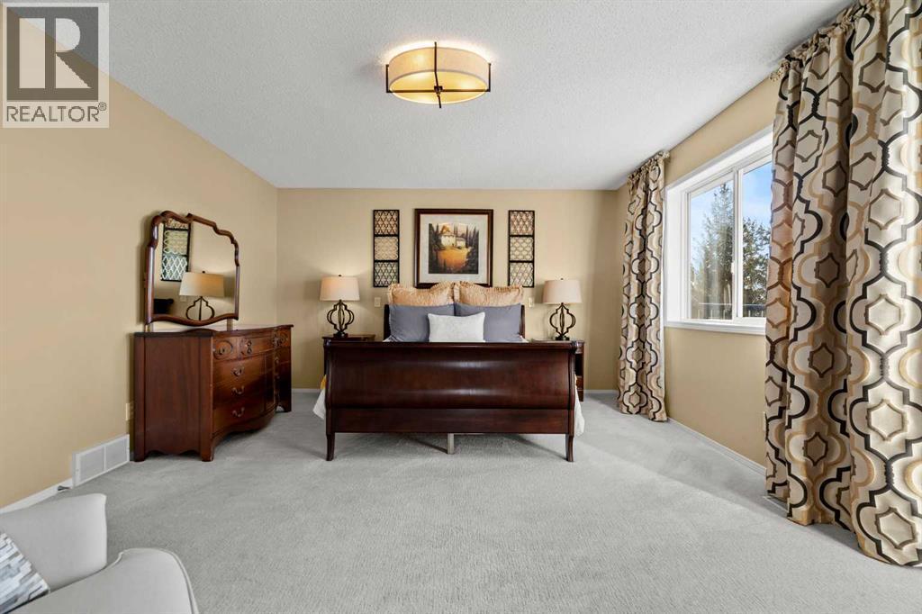63 Springbank Crescent Sw, Calgary, AB - Indoor Photo Showing Bedroom