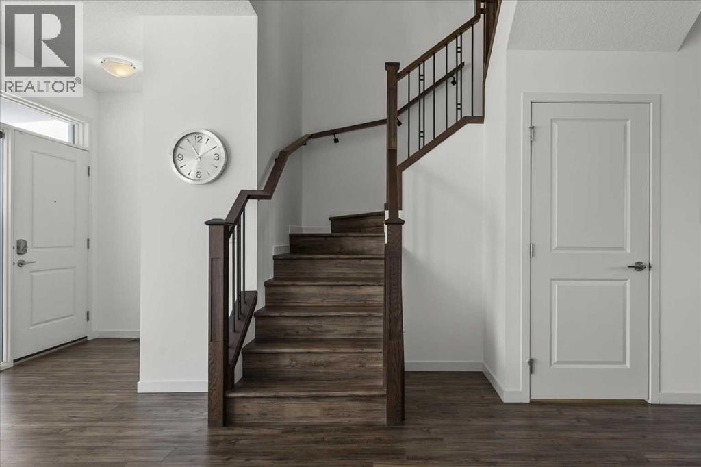 Lets go see the upper level.. - 59 Wolf Hollow Way Se, Calgary, AB - Indoor Photo Showing Other Room