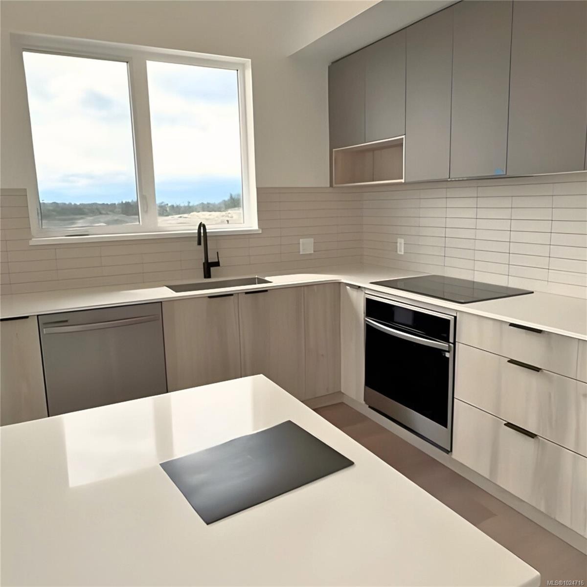 413-3564B Ryder Hesjedal Way, Colwood, BC - Indoor Photo Showing Kitchen With Upgraded Kitchen