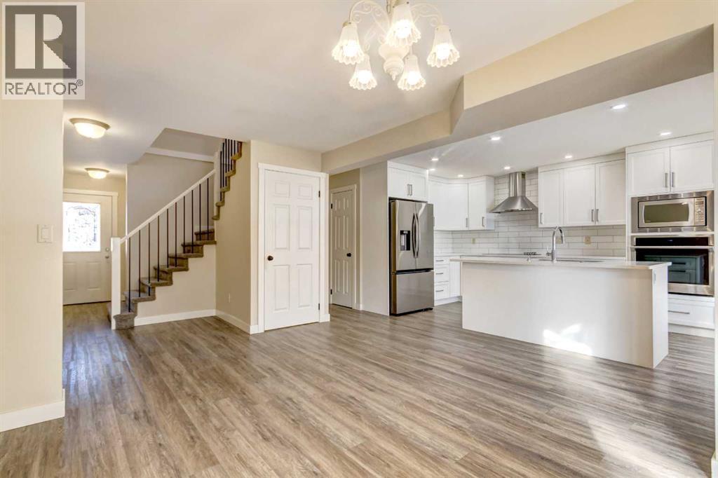 83 Hawkfield Crescent Nw, Calgary, AB - Indoor Photo Showing Kitchen With Stainless Steel Kitchen With Double Sink