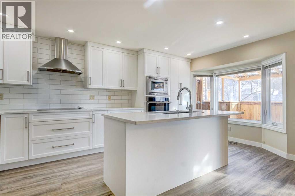 83 Hawkfield Crescent Nw, Calgary, AB - Indoor Photo Showing Kitchen With Upgraded Kitchen