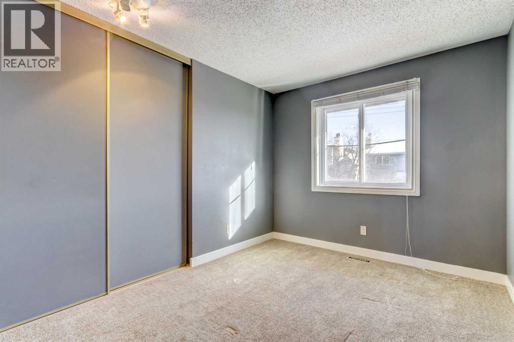 83 Hawkfield Crescent Nw, Calgary, AB - Indoor Photo Showing Other Room