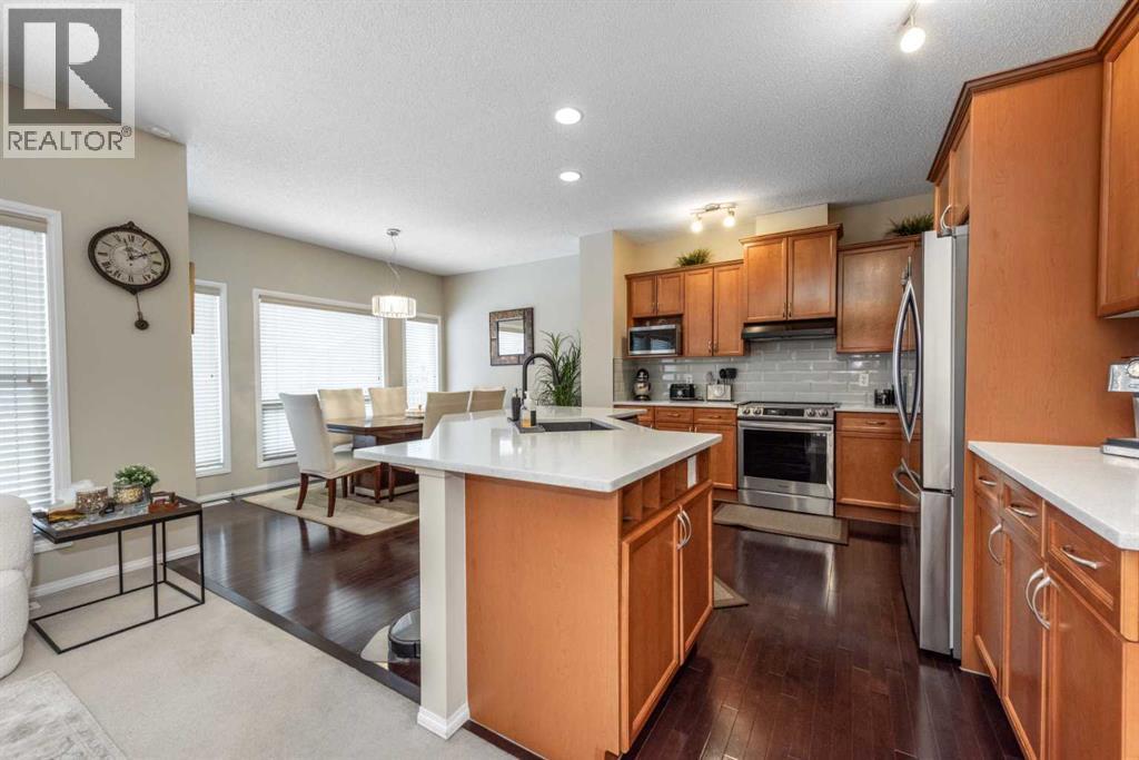 212 Silverado Range Heights Sw, Calgary, AB - Indoor Photo Showing Kitchen With Stainless Steel Kitchen