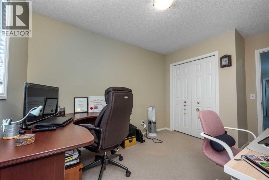 212 Silverado Range Heights Sw, Calgary, AB - Indoor Photo Showing Office