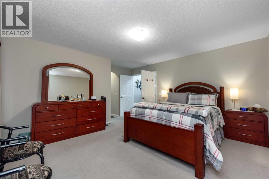 212 Silverado Range Heights Sw, Calgary, AB - Indoor Photo Showing Bedroom