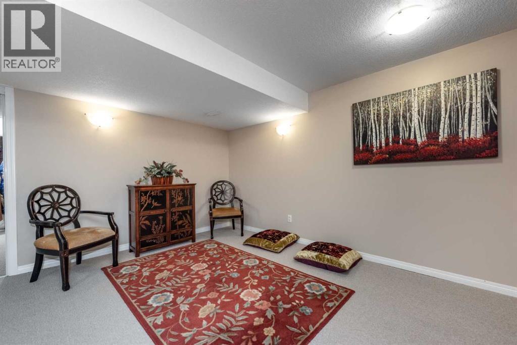 212 Silverado Range Heights Sw, Calgary, AB - Indoor Photo Showing Other Room