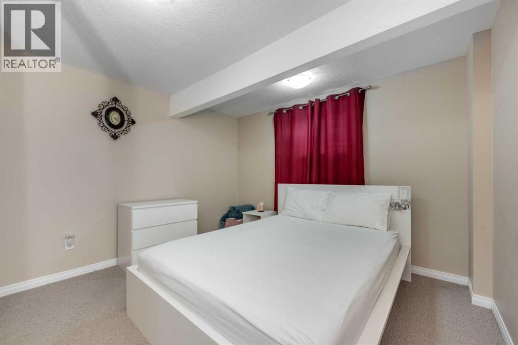 212 Silverado Range Heights Sw, Calgary, AB - Indoor Photo Showing Bedroom