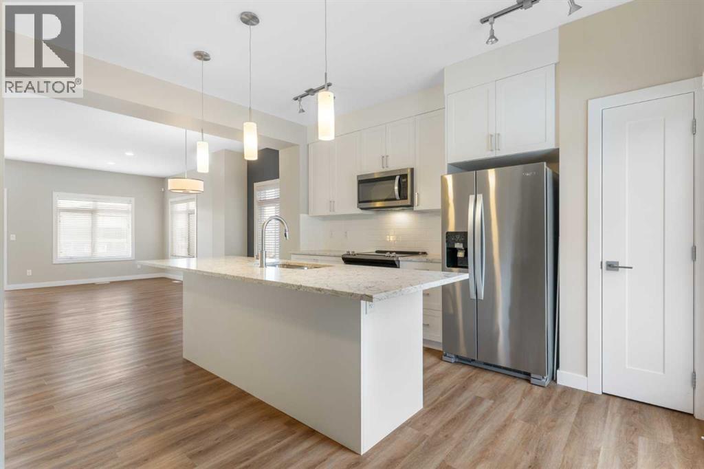 Kitchen, pantry - 217 Sage Bluff Drive Nw, Calgary, AB - Indoor Photo Showing Kitchen With Upgraded Kitchen
