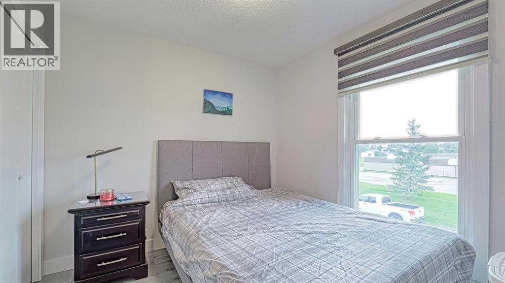 559 Abinger Road Ne, Calgary, AB - Indoor Photo Showing Bedroom
