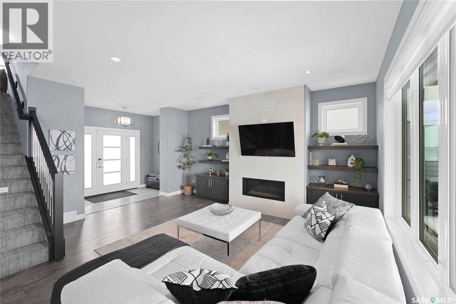 4357 Albulet Drive, Regina, SK - Indoor Photo Showing Living Room With Fireplace