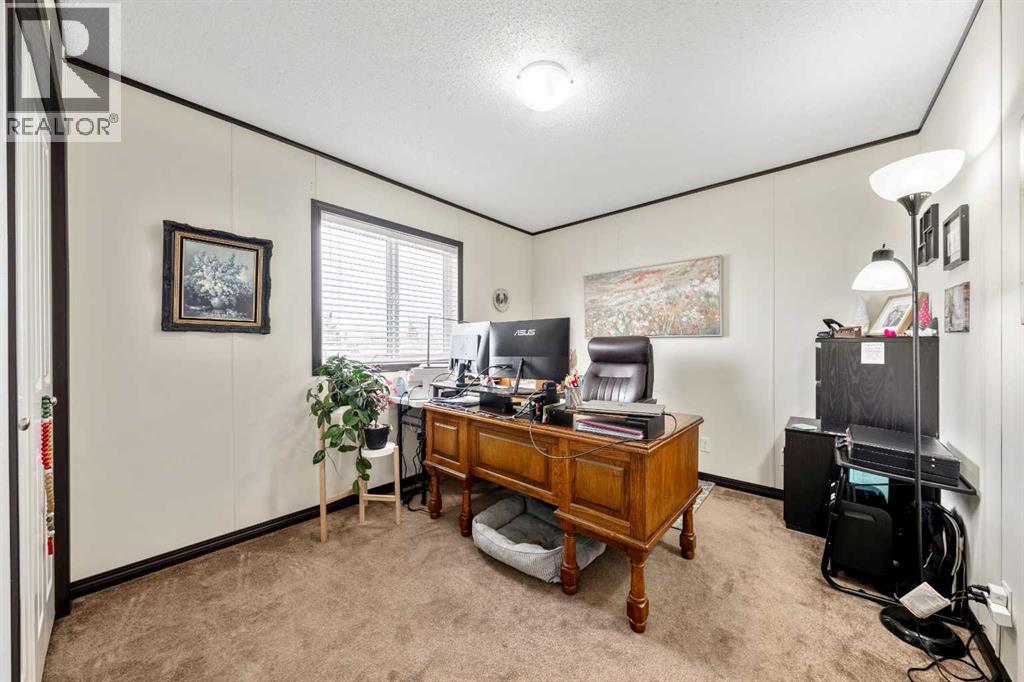 3rd Sizable Bedroom - 4 Spring Dale Circle Se, Airdrie, AB - Indoor Photo Showing Office