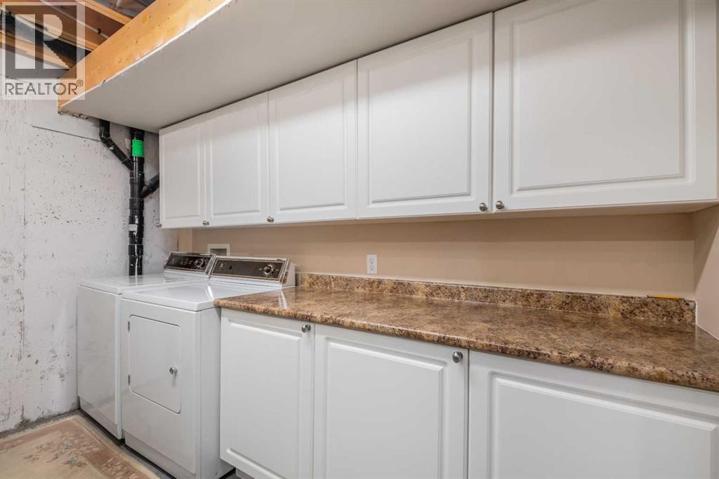 115 Chaparral Point Se, Calgary, AB - Indoor Photo Showing Laundry Room