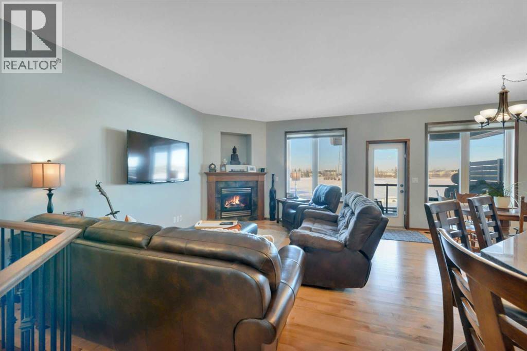 132 Illingworth Close, Red Deer, AB - Indoor Photo Showing Living Room With Fireplace
