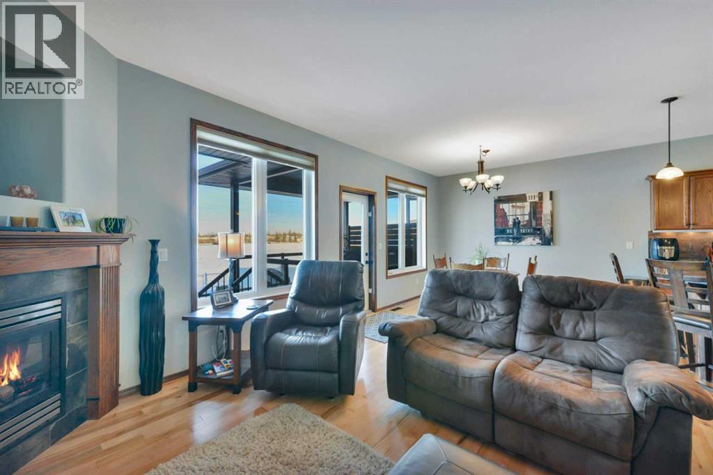 132 Illingworth Close, Red Deer, AB - Indoor Photo Showing Living Room With Fireplace