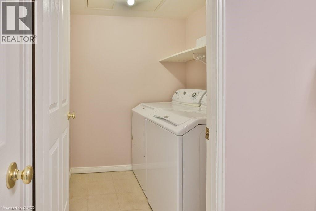 1800 The Collegeway Unit# 211, Mississauga, ON - Indoor Photo Showing Laundry Room