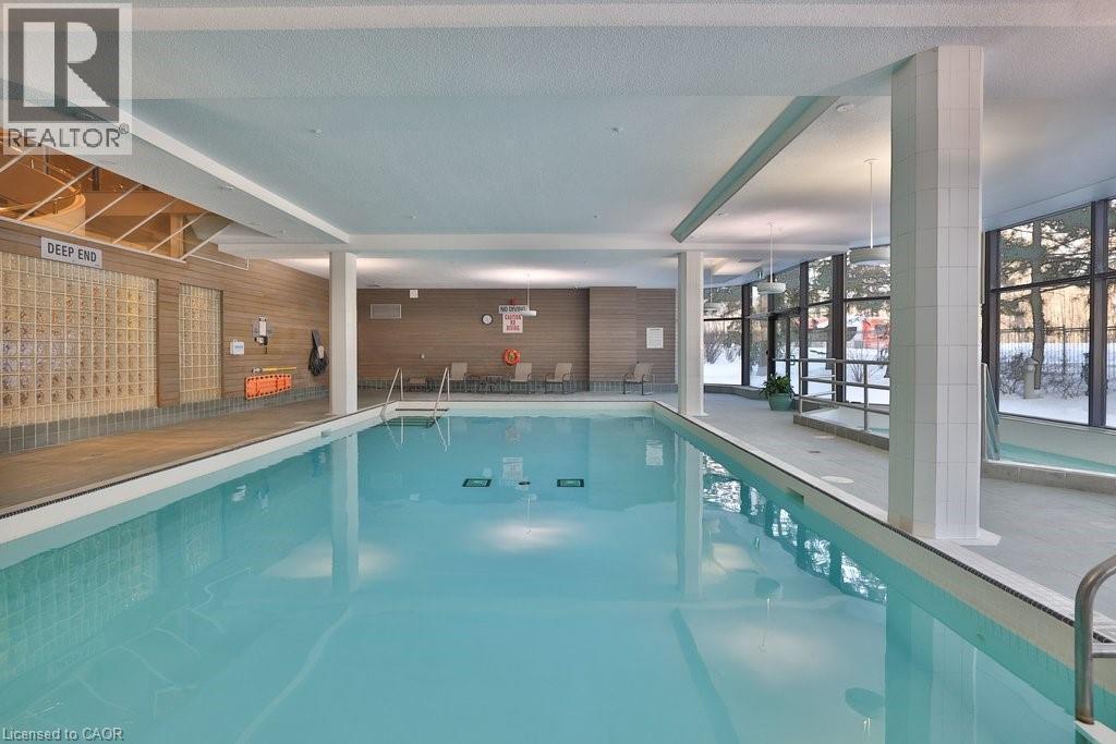 1800 The Collegeway Unit# 211, Mississauga, ON - Indoor Photo Showing Other Room With In Ground Pool