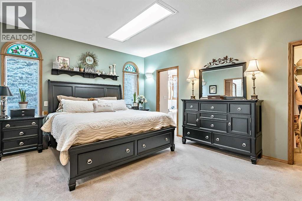 607 9 Street Se, High River, AB - Indoor Photo Showing Bedroom