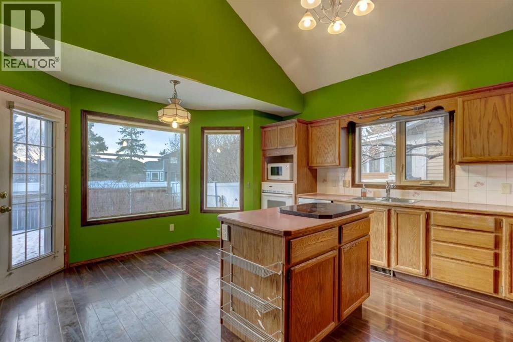 184 Riverbend Drive Se, Calgary, AB - Indoor Photo Showing Kitchen With Double Sink