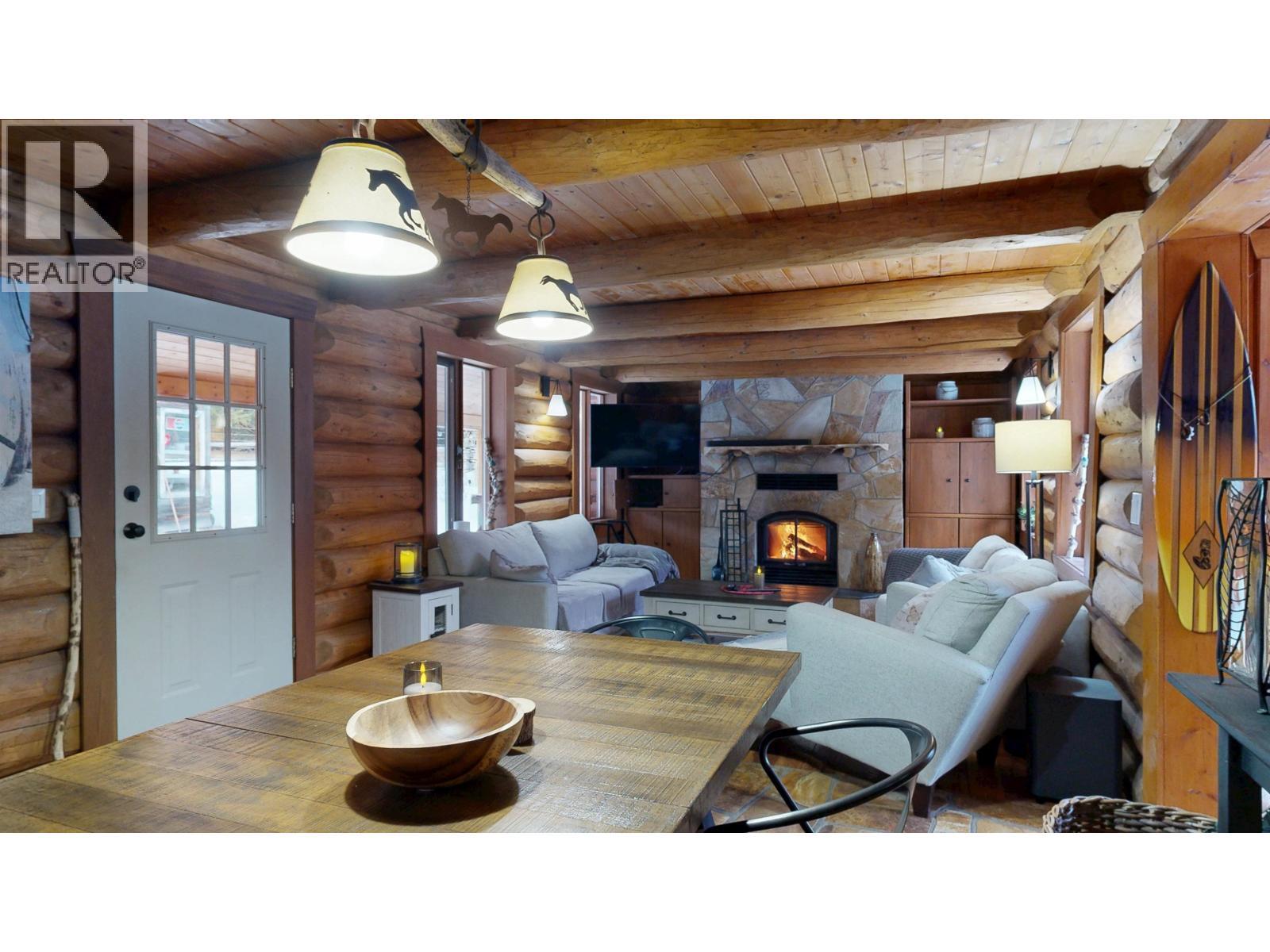 7671 Rutherford Road, Bridge Lake, BC - Indoor With Fireplace