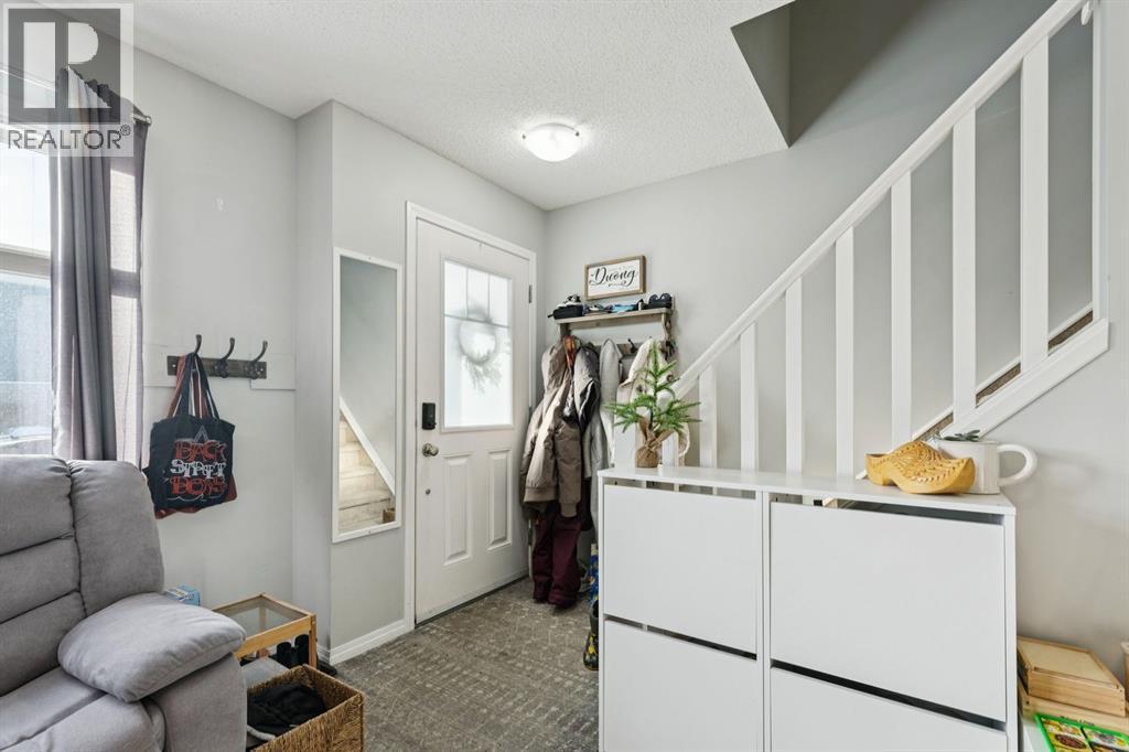 996 Windsong Drive Sw, Airdrie, AB - Indoor Photo Showing Other Room