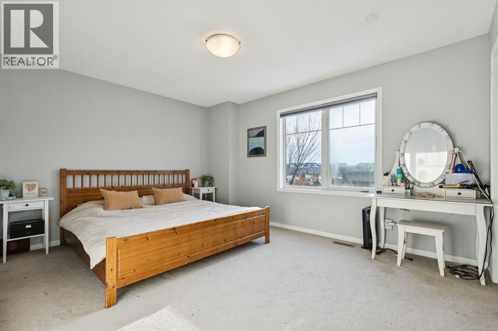 996 Windsong Drive Sw, Airdrie, AB - Indoor Photo Showing Bedroom