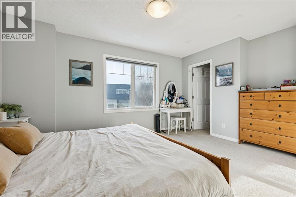 996 Windsong Drive Sw, Airdrie, AB - Indoor Photo Showing Bedroom