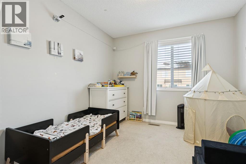 996 Windsong Drive Sw, Airdrie, AB - Indoor Photo Showing Other Room