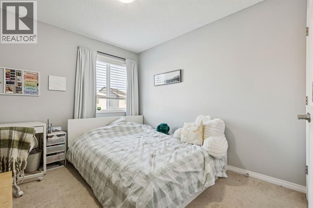 996 Windsong Drive Sw, Airdrie, AB - Indoor Photo Showing Bedroom