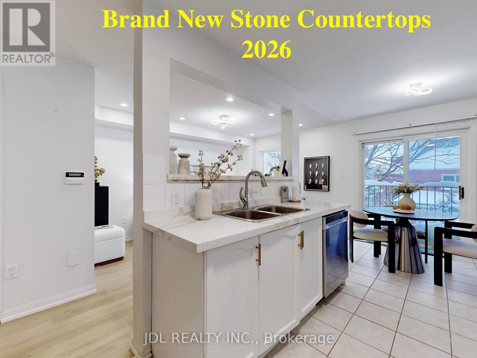 39 - 2 Clay Brick Court, Brampton, ON - Indoor Photo Showing Kitchen With Double Sink
