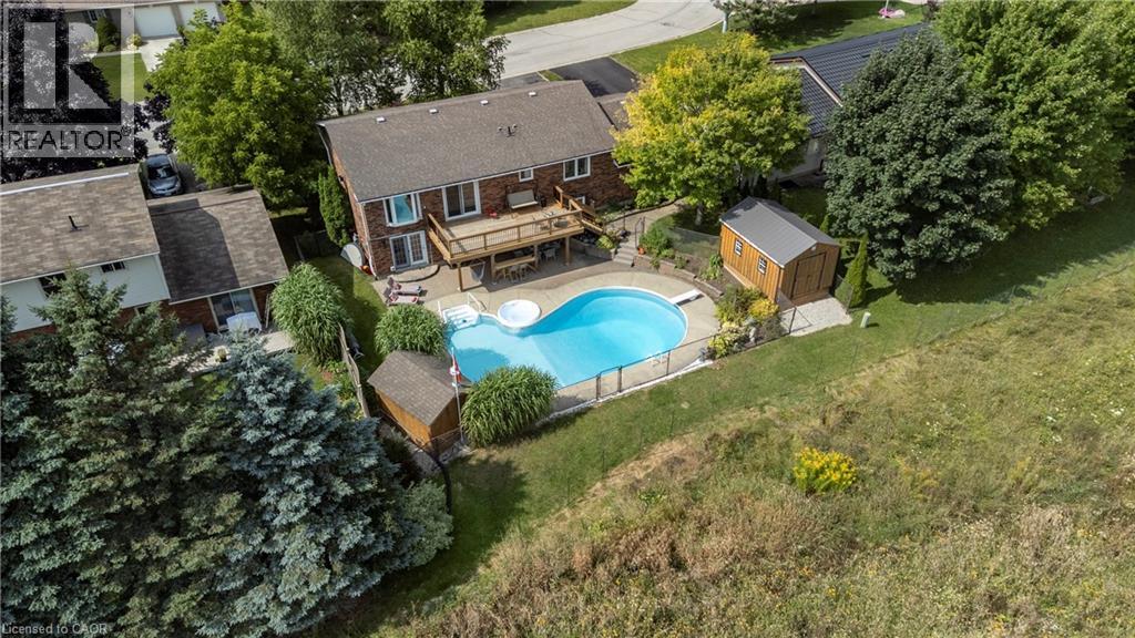 Aerial view of a pool area - 29 Armstrong Crescent, Grey Highlands, ON - Outdoor With In Ground Pool With Deck Patio Veranda