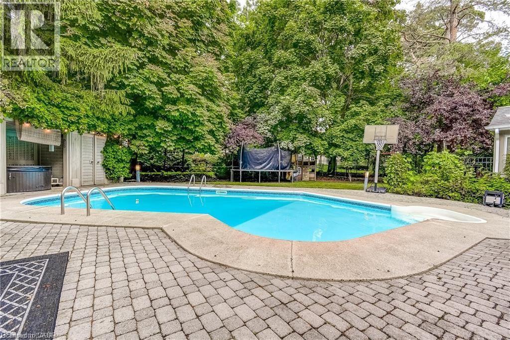 3021 Lakeshore Road, Burlington, ON - Outdoor With In Ground Pool With Backyard