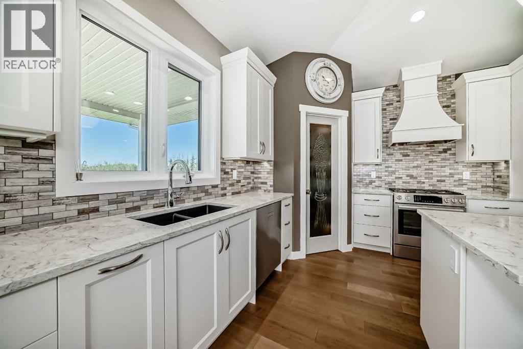 3 - 255049 Township Rd 432, Rural Ponoka County, AB - Indoor Photo Showing Kitchen With Double Sink With Upgraded Kitchen