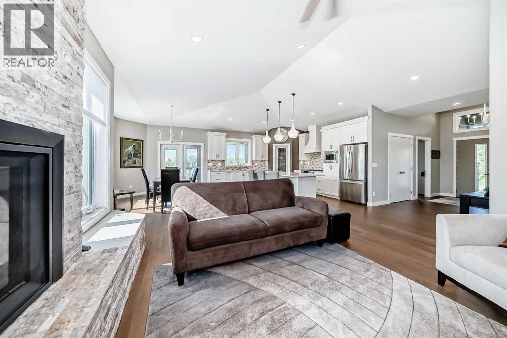 3 - 255049 Township Rd 432, Rural Ponoka County, AB - Indoor Photo Showing Living Room With Fireplace