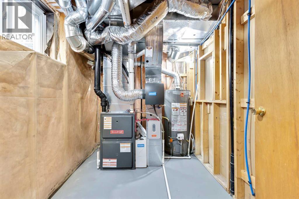 New Dual Stage/Multi Zone Furnace & H/W Tank - 7 Mountain Park Circle Se, Calgary, AB - Indoor Photo Showing Basement