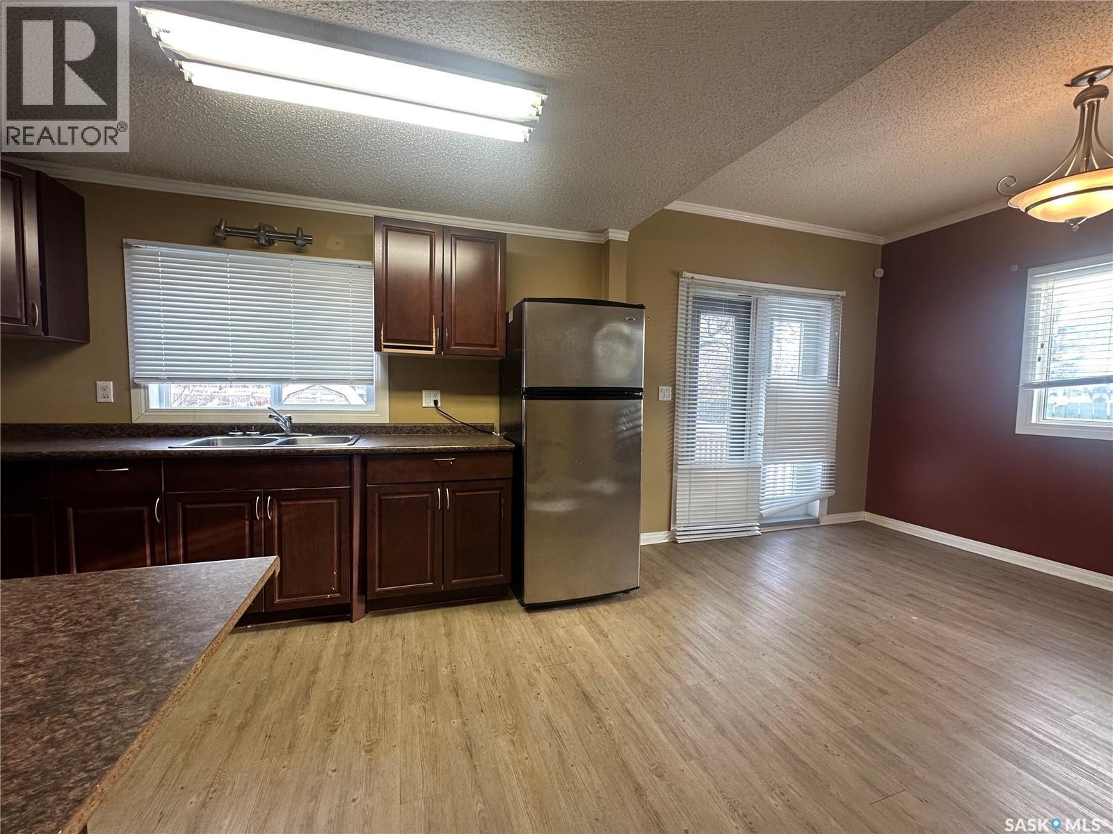 59 Haultain Avenue, Yorkton, SK - Indoor Photo Showing Kitchen With Double Sink
