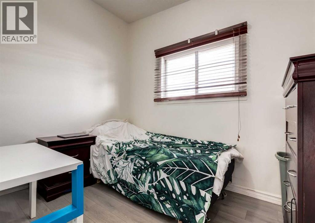 7634 & 7636 22A Street Se, Calgary, AB - Indoor Photo Showing Bedroom