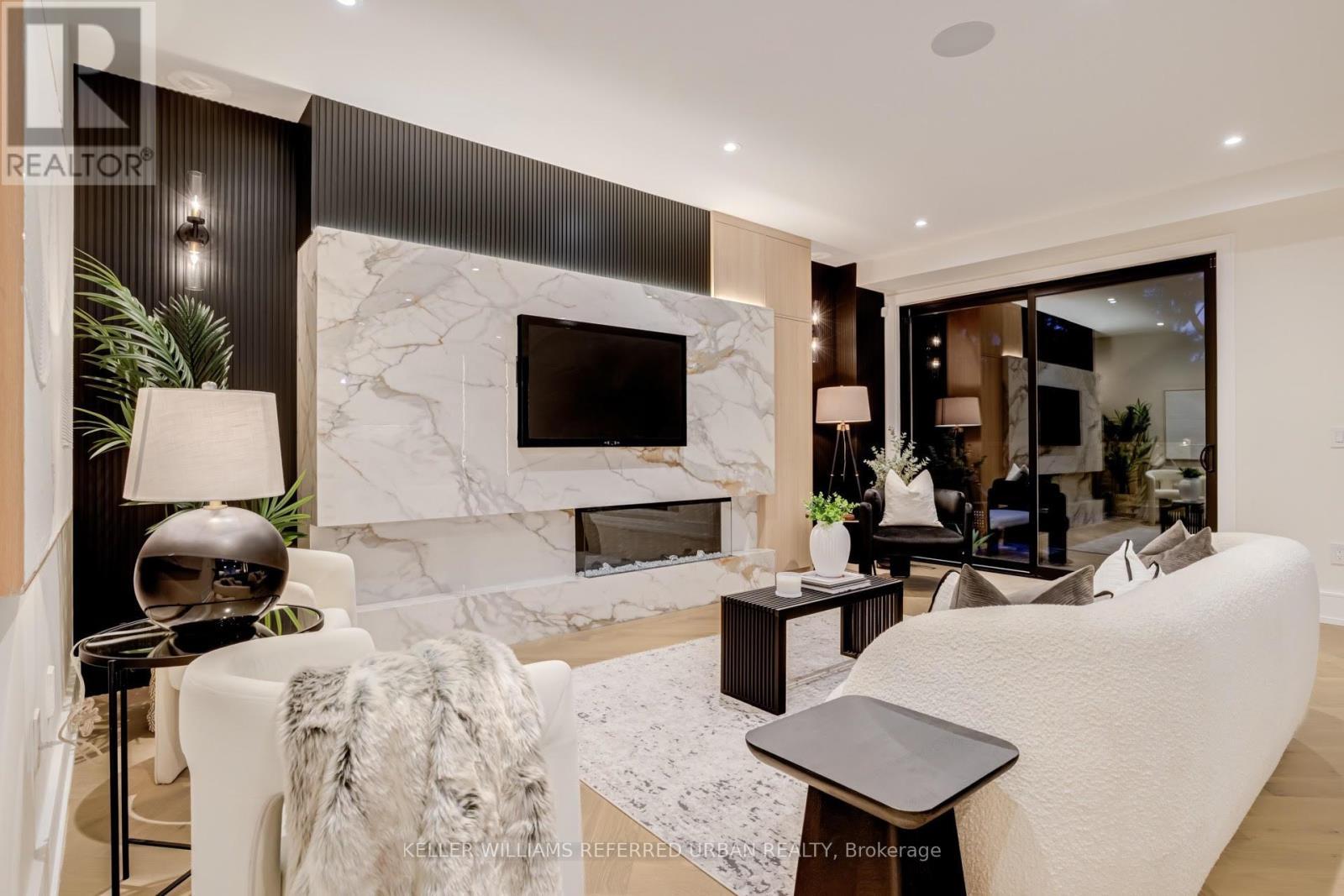 33 Twelfth Street, Toronto, ON - Indoor Photo Showing Living Room With Fireplace